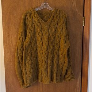 Cozy Rust Cable Knit Sweater. Hood in back, very soft knit. 100% poly.